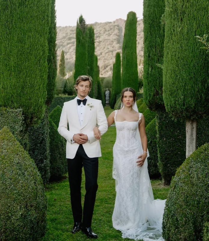 photo-by-millie-bobby-brown-on-october-02-2024.-may-be-an-image-of-2-people-suit-dinner-jacket-wedding-and-the-villa-deste.